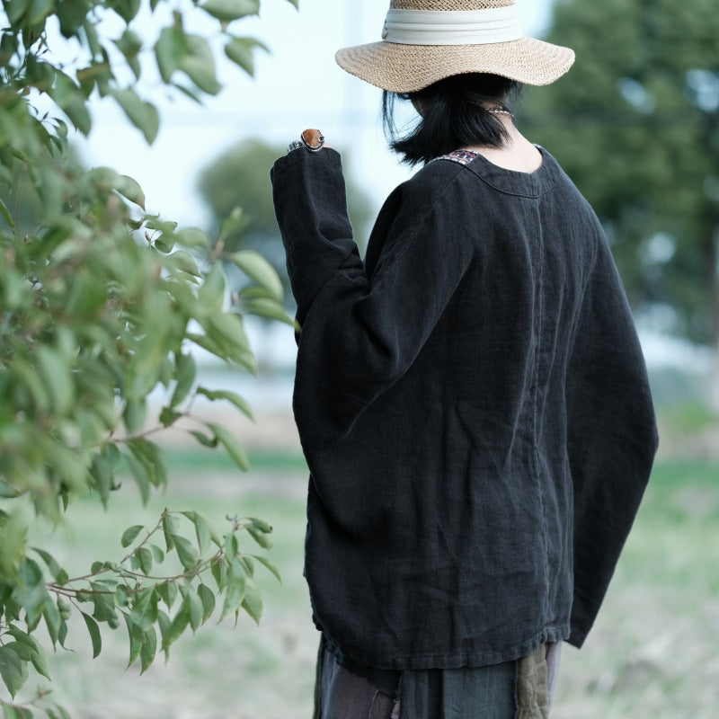 Lifestyle shot wearing Bohemian Embroidered Linen Top in casual outdoor setting