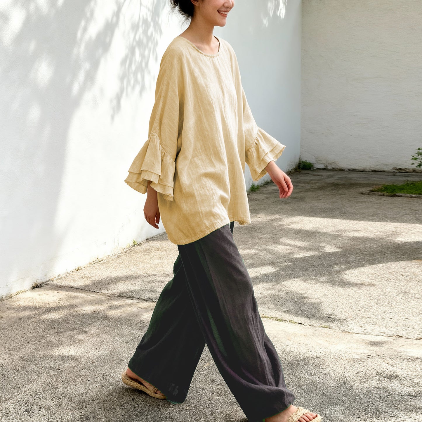 Side profile of breezy cotton-linen blend shirt.