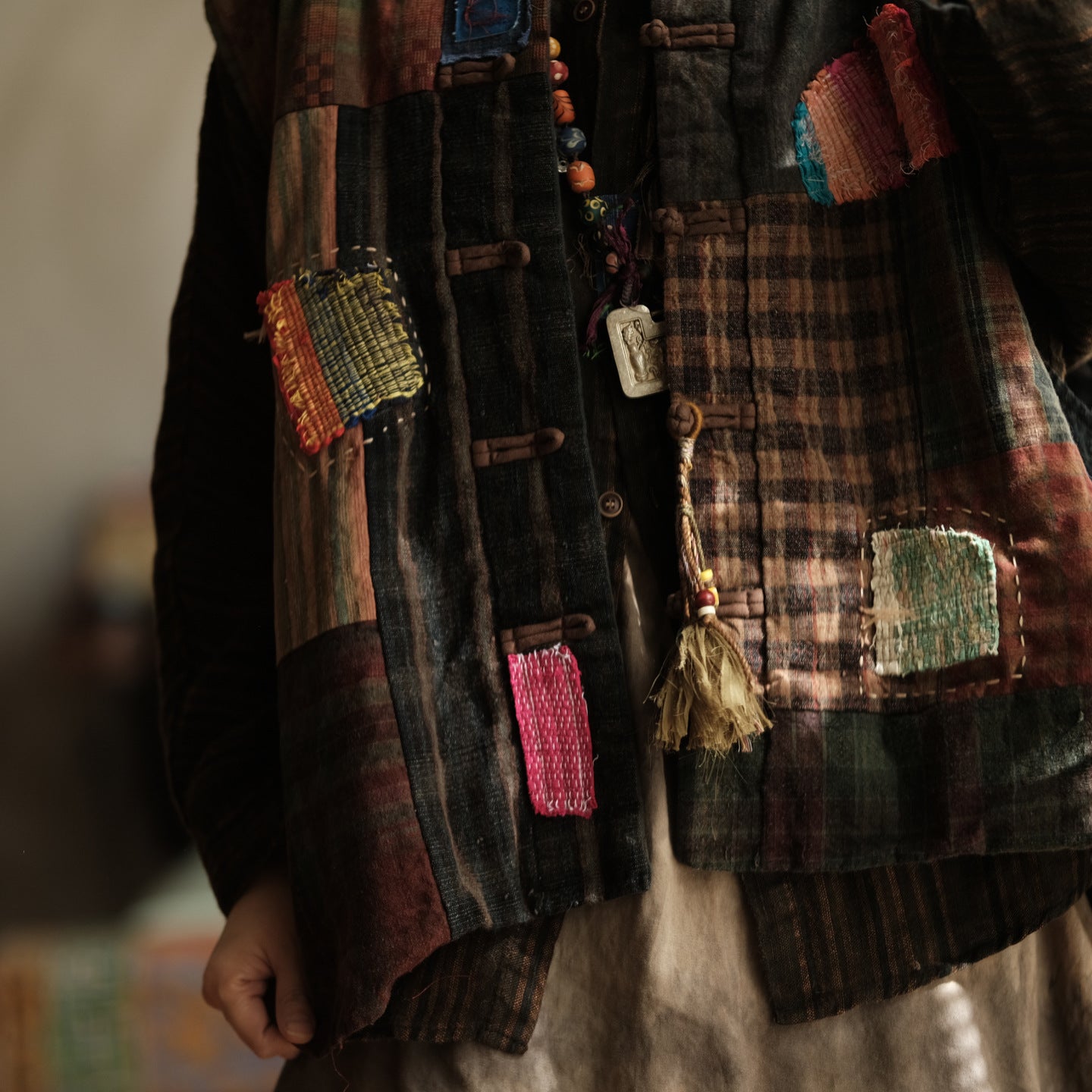 Vintage-inspired patchwork quilted vest detail