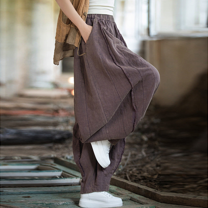 Model wearing boho style distressed cotton-linen pants outfit