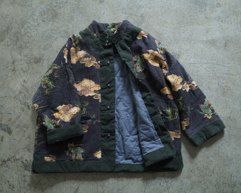 Close-up of distressed cloud print on quilted jacket