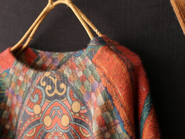 Model wearing retro printed pullover sweater casual outfit