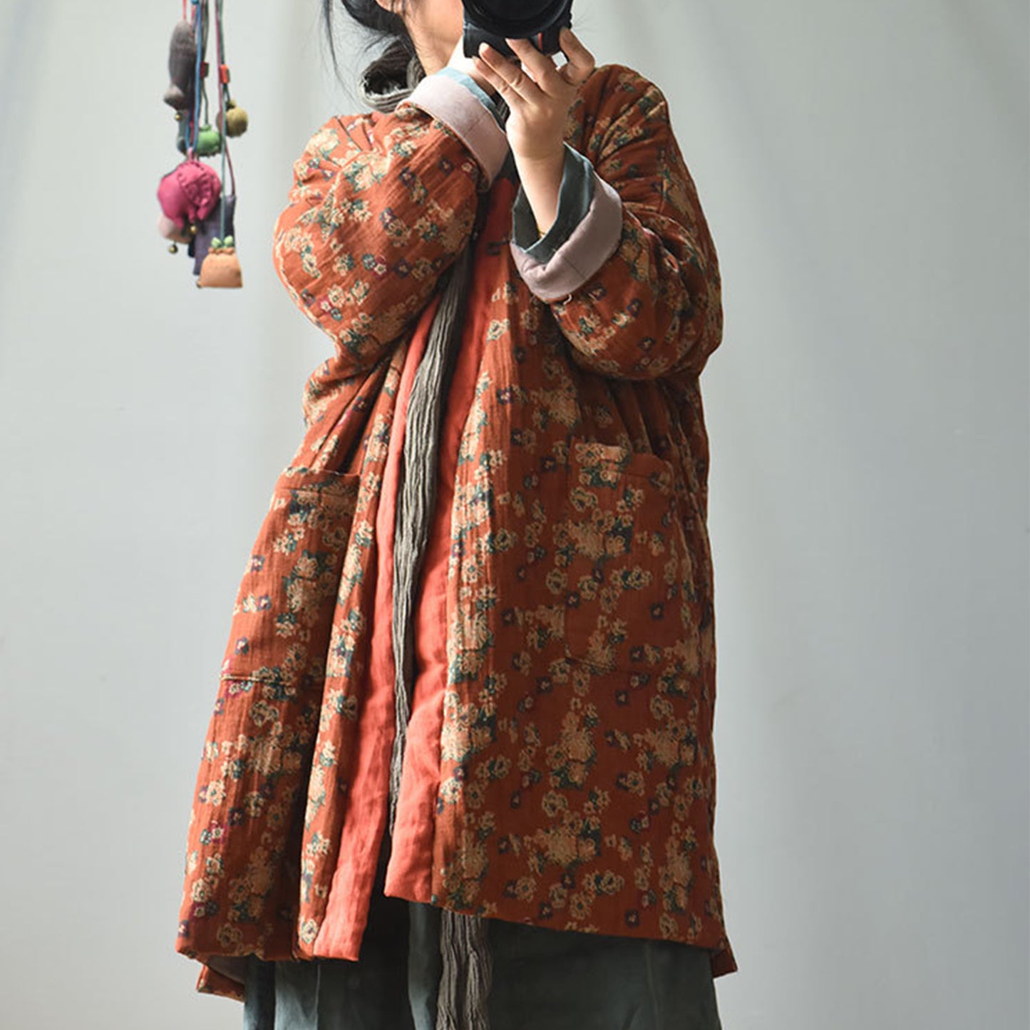 Model wearing vintage floral padded coat cozy retro outfit