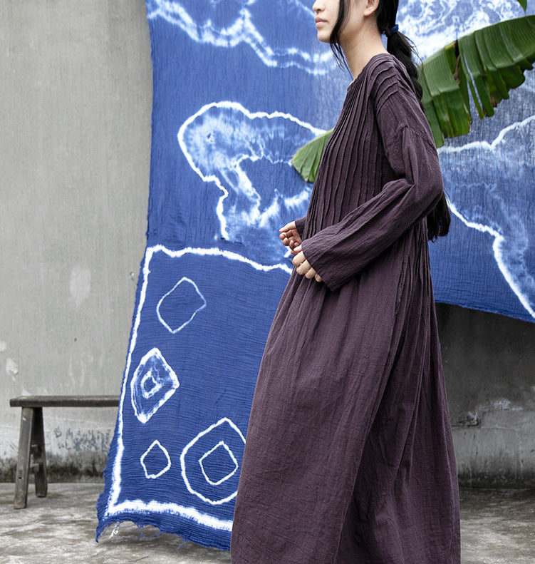 Close-up fabric detail of accordion pleated dress