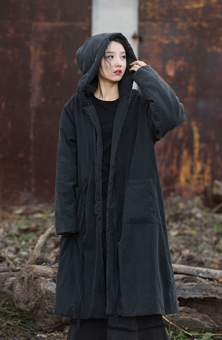 Black hooded quilted coat with relaxed fit