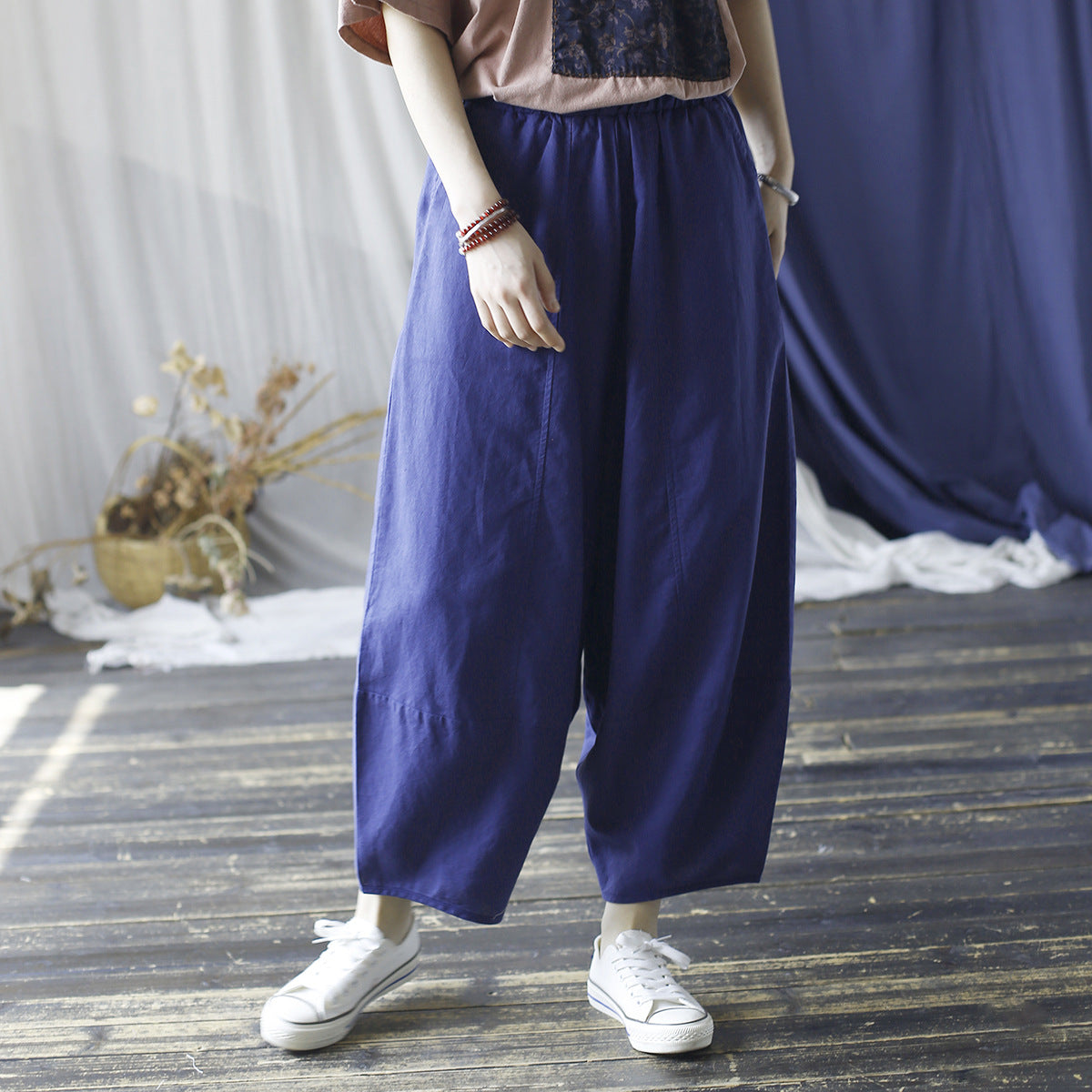 Blue front view of relaxed cotton linen pants with an elastic waist