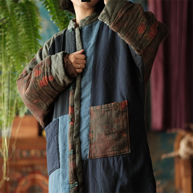 Front view of blue colorblock patchwork quilted coat with vintage design