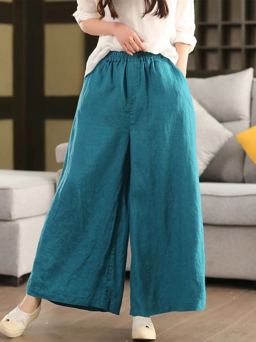 Model wearing relaxed wide-leg linen pants for a summer look