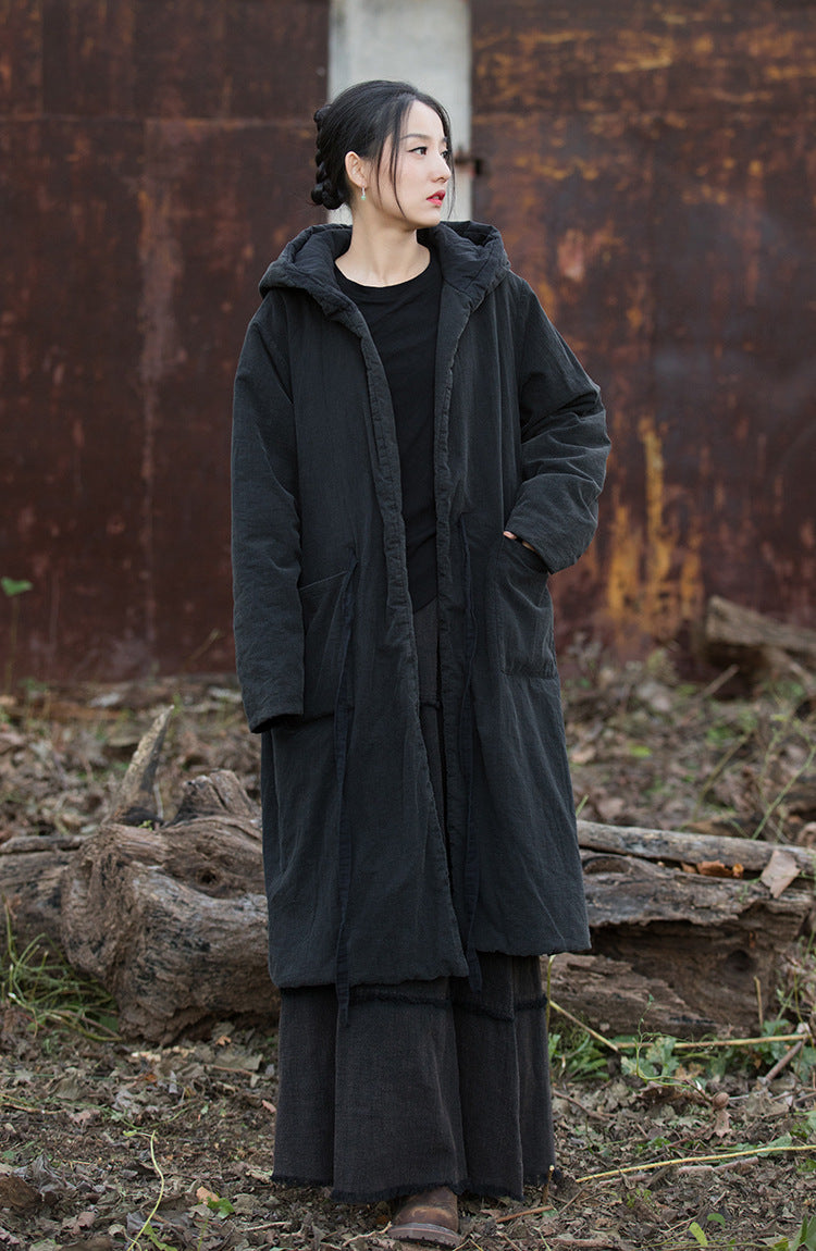 Chic black quilted coat styled for winter