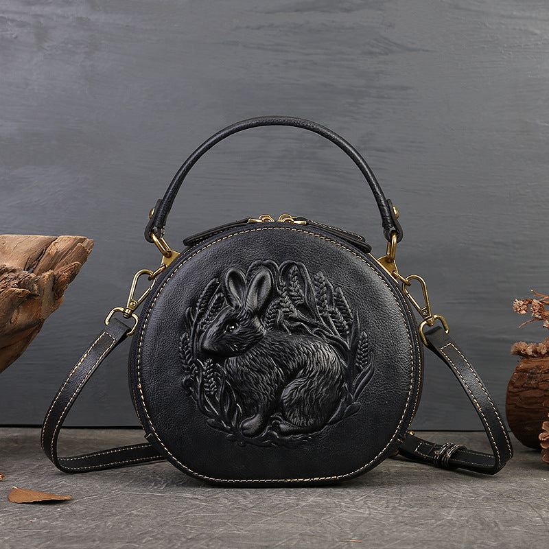 Close-up of rabbit pattern genuine leather handbag texture