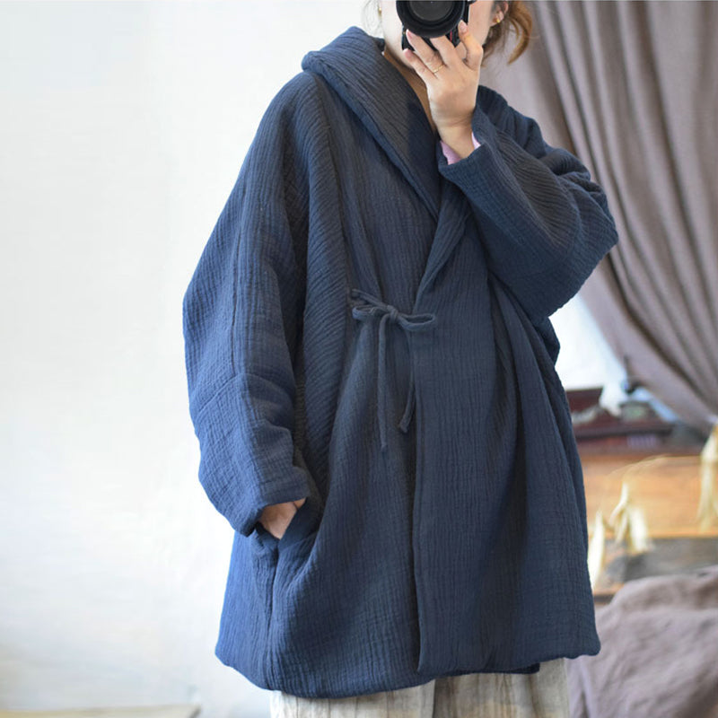 Styled outfit featuring collared crinkled quilted coat