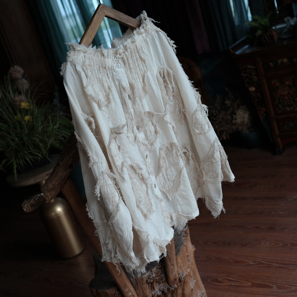 Back view showing relaxed fit and button detail of cotton blouse