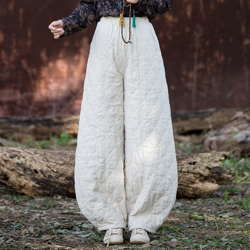 white outfit styled with cozy linen quilted pants