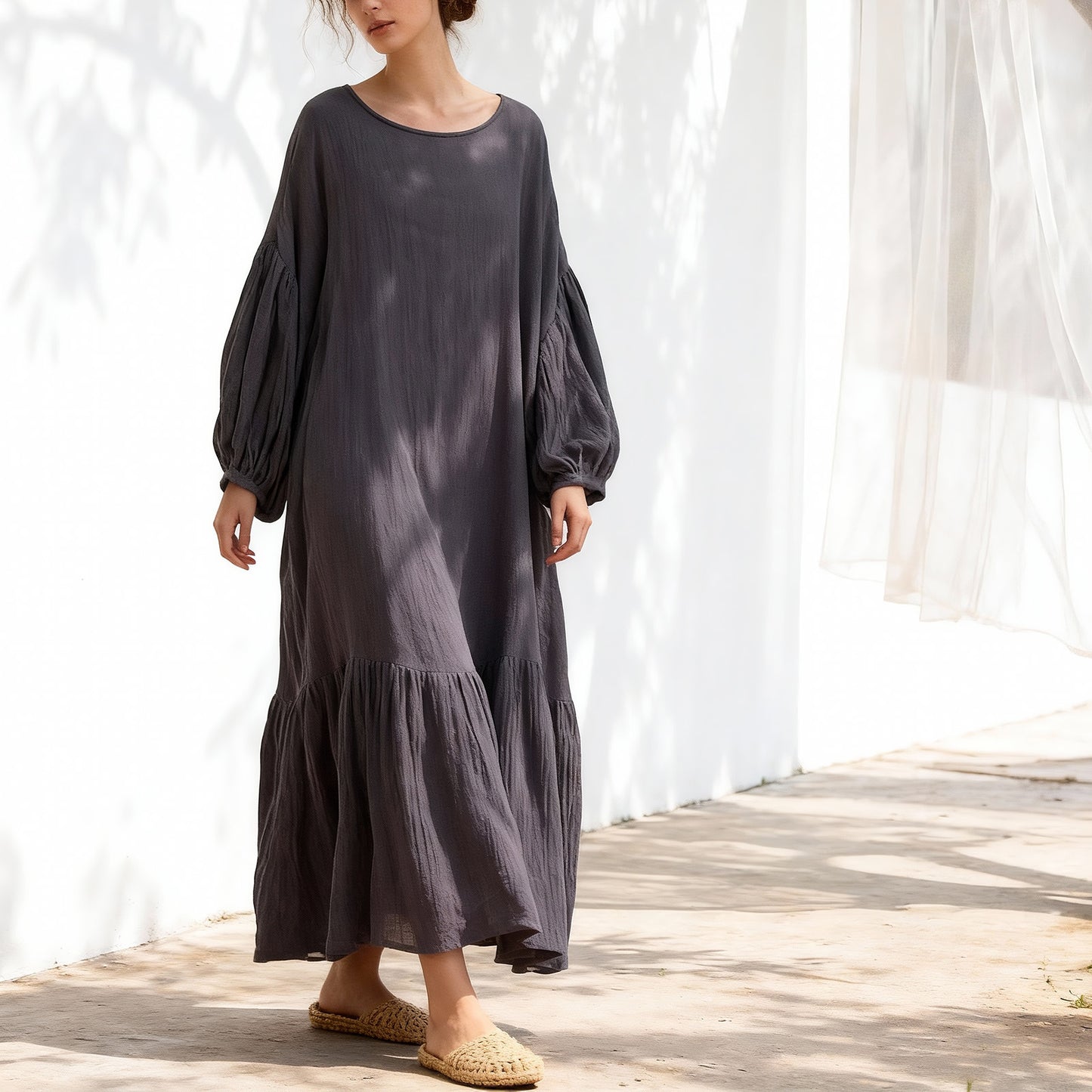 Woman wearing ramie lantern sleeve dress 