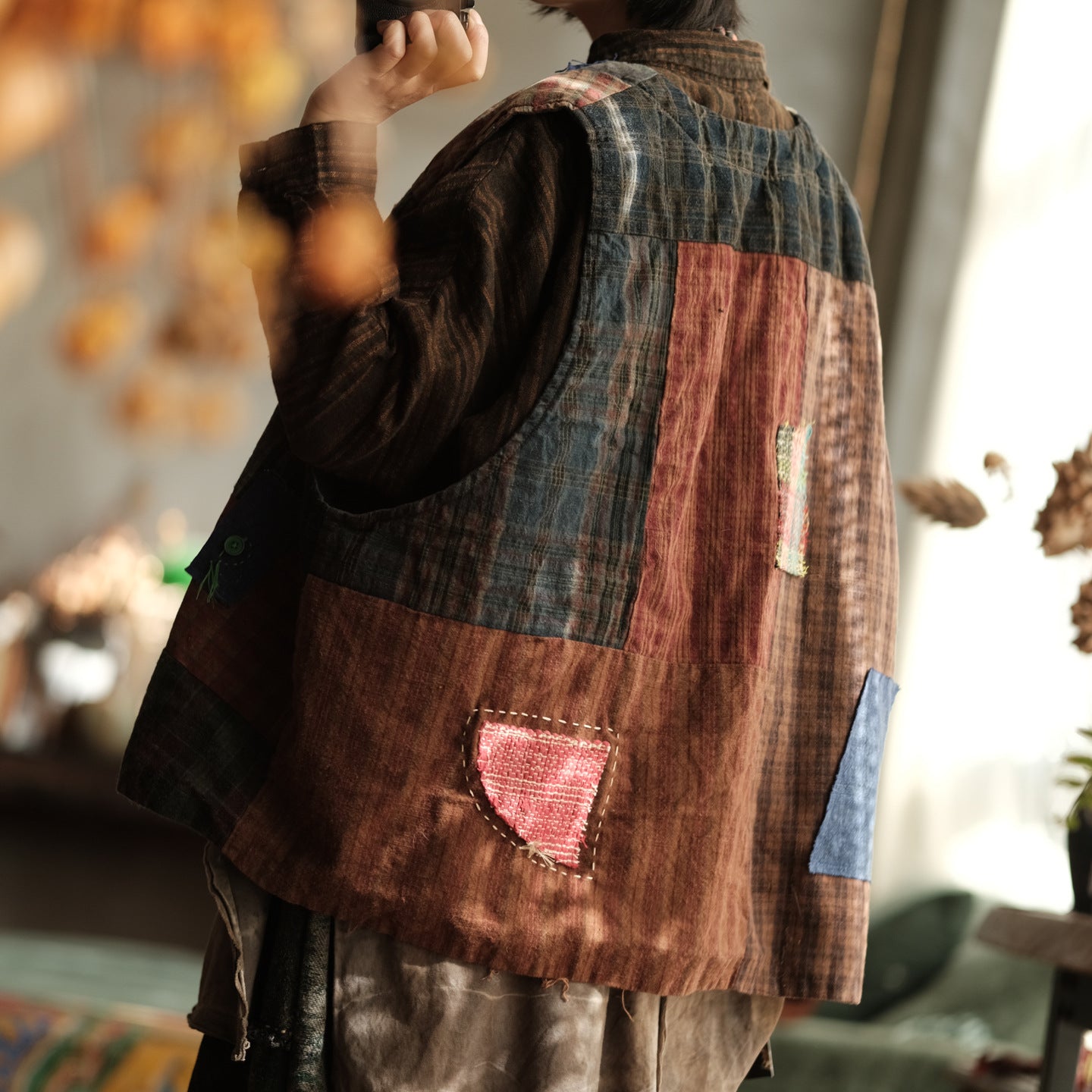 Back view of vintage patchwork quilted padded vest