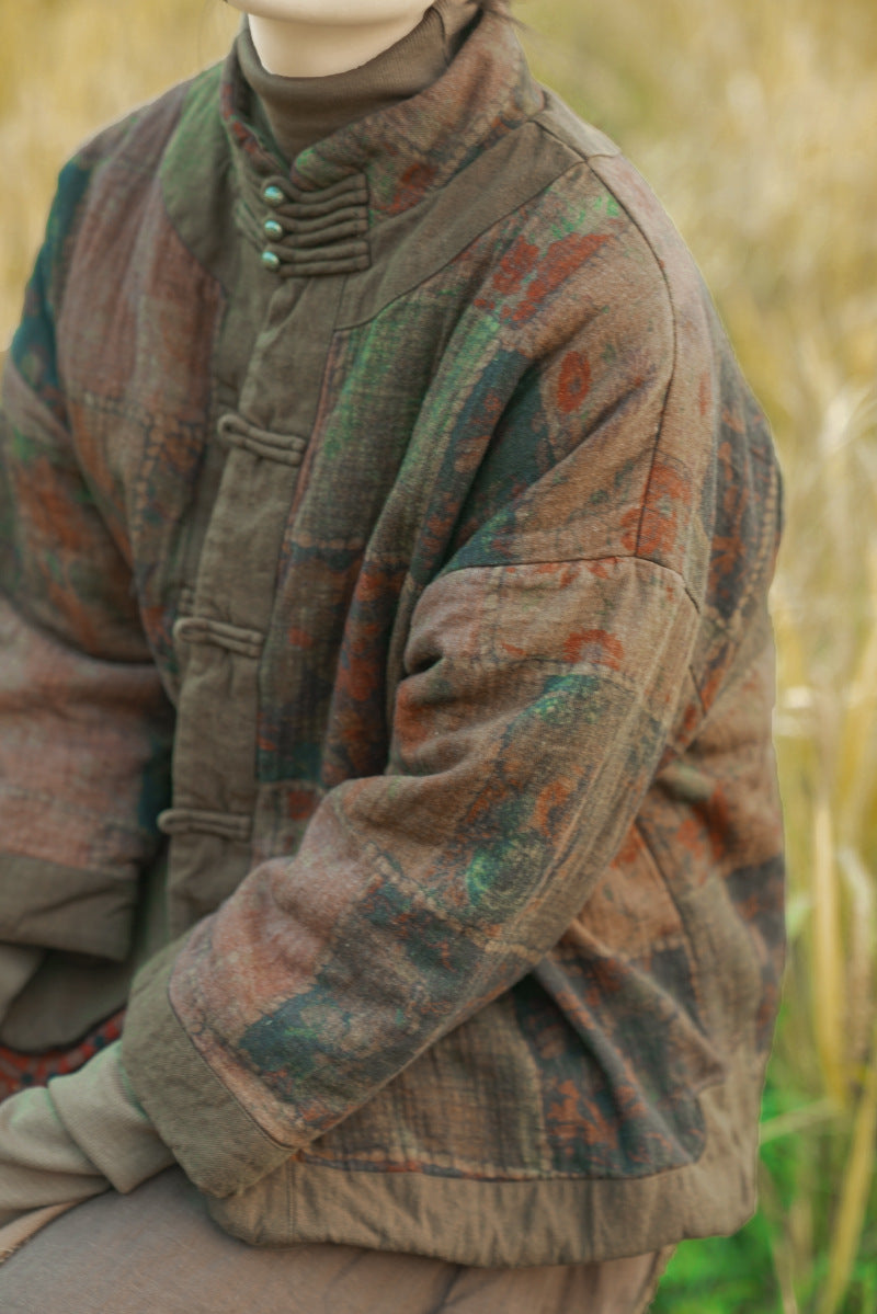 Side view of retro distressed printed quilted coat