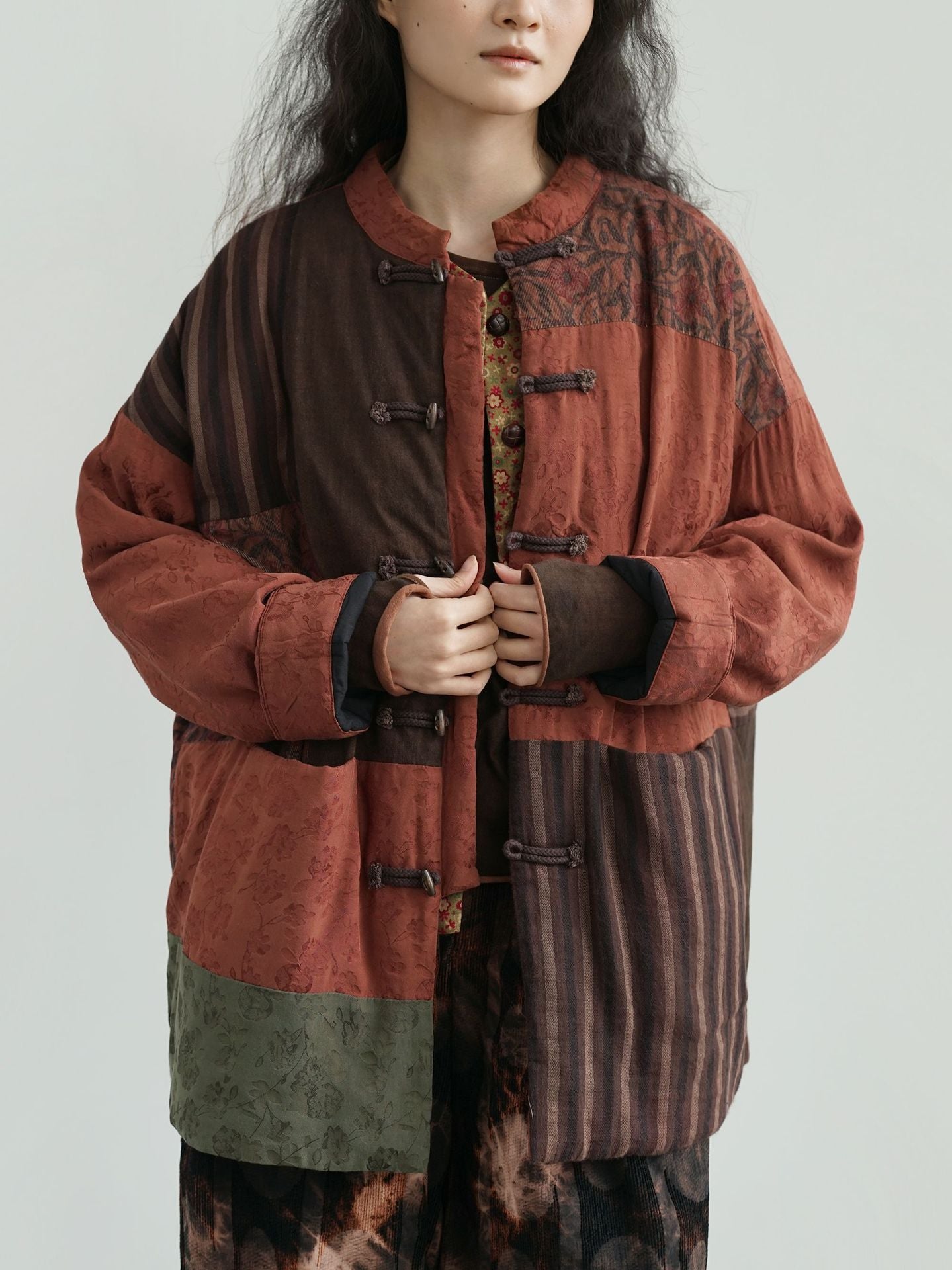 Model styling vintage patchwork padded jacket with autumn outfit