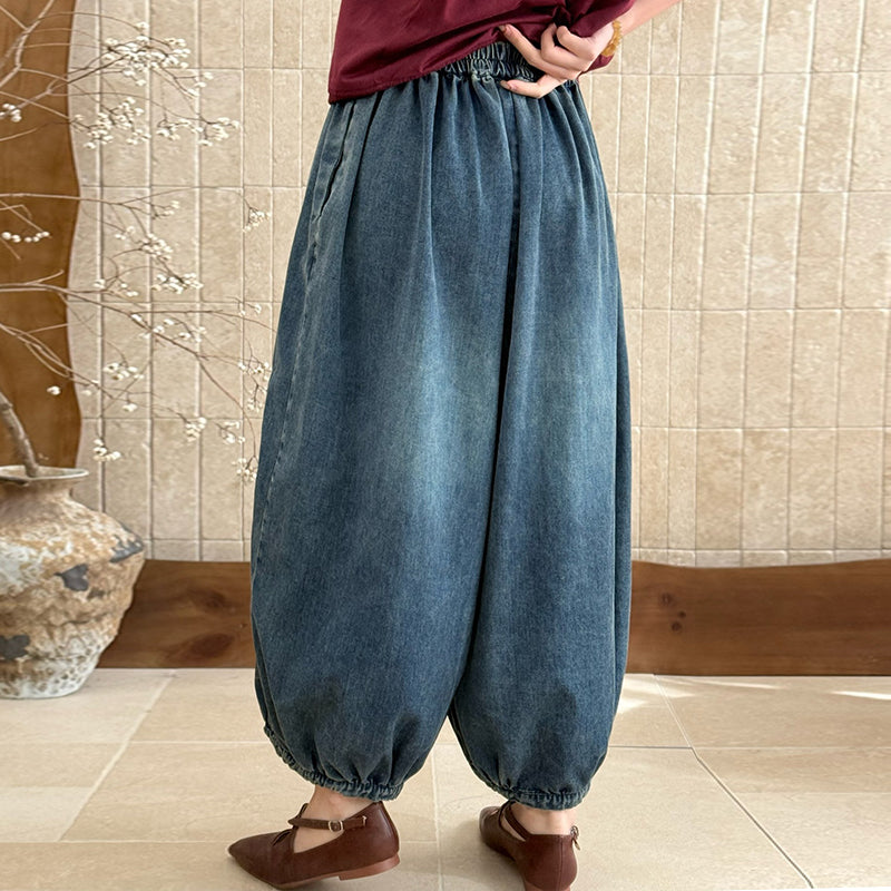 Back view of relaxed embroidered floral pants for women