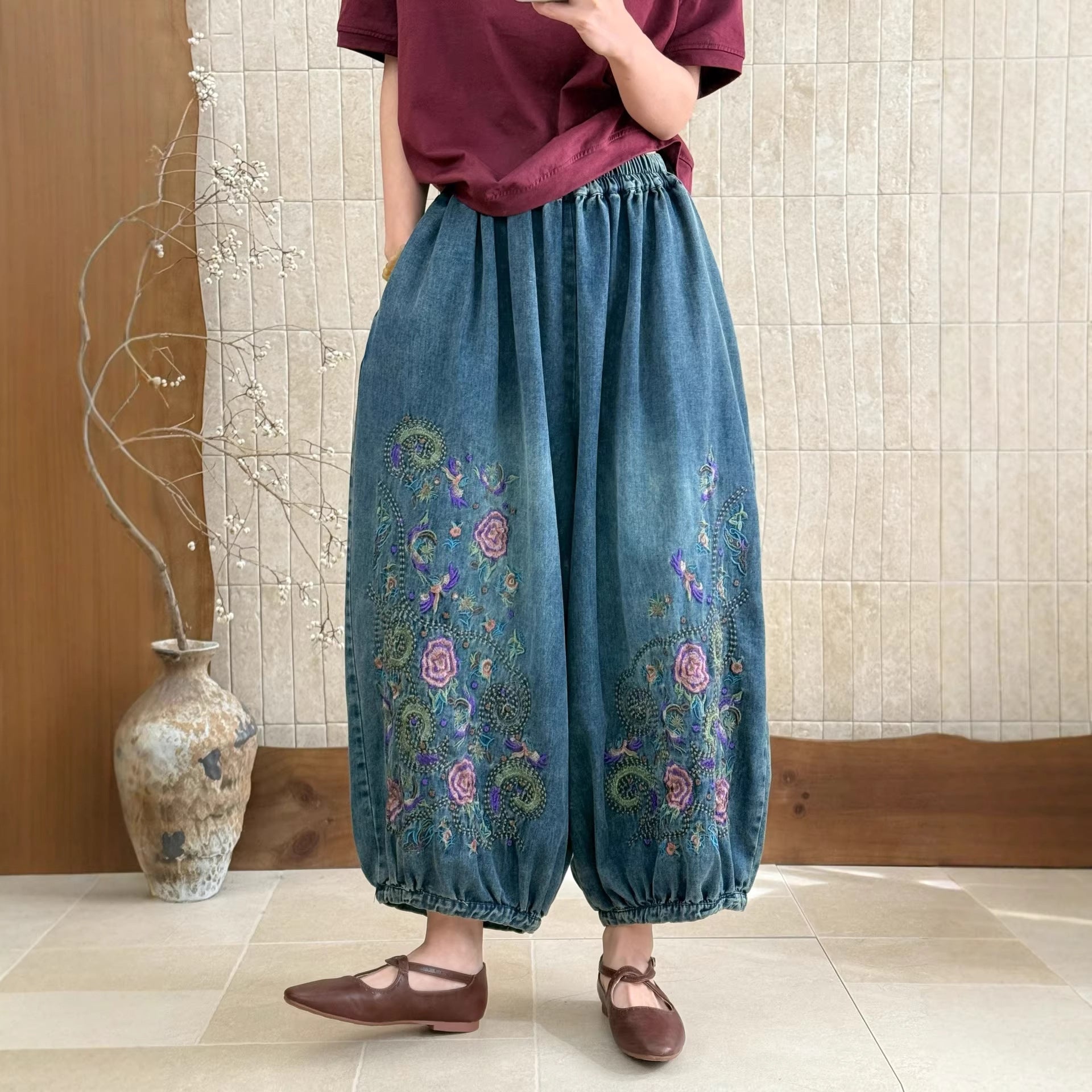 Embroidered floral pants front view with a relaxed everyday fit