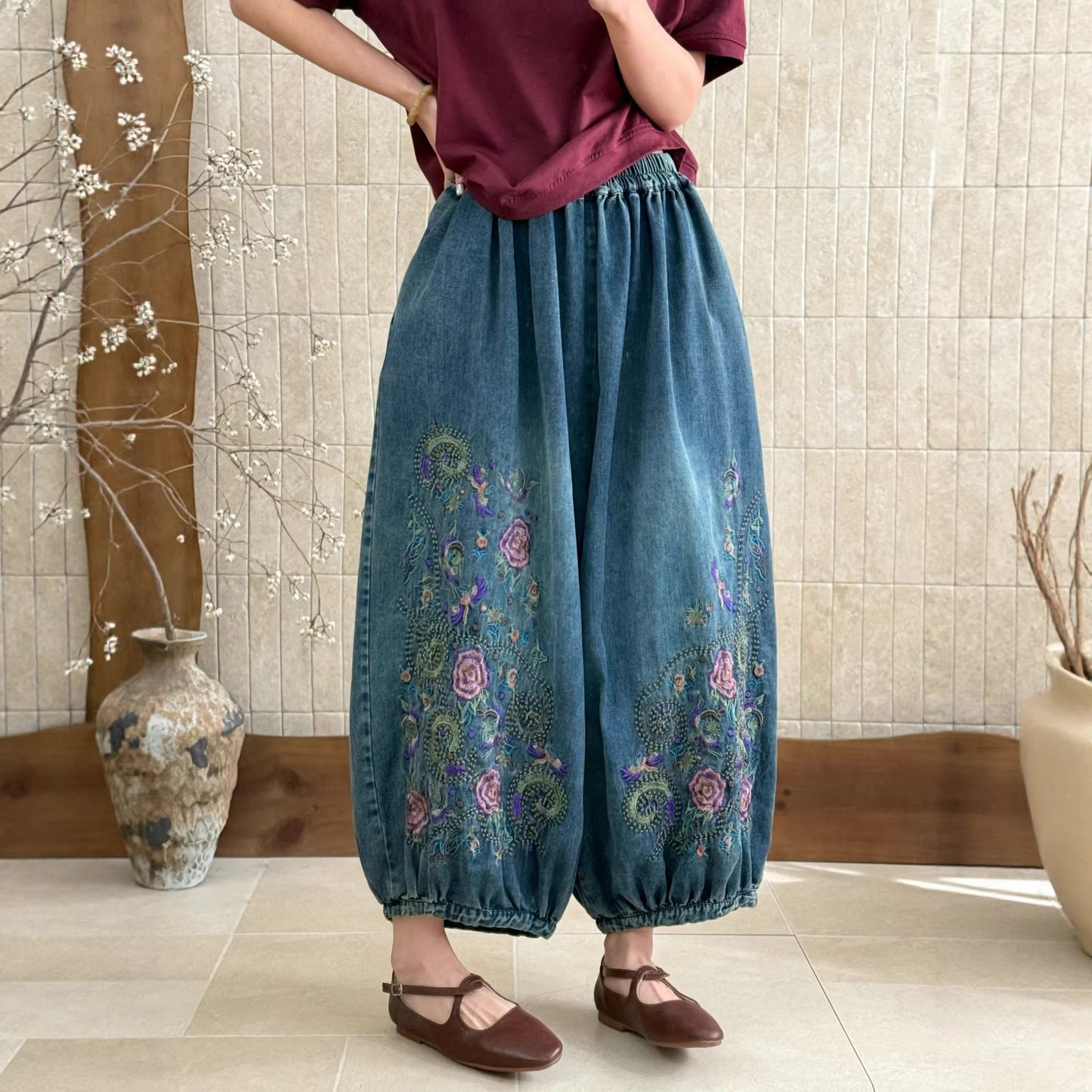 Women’s embroidered floral pants styled with a simple top