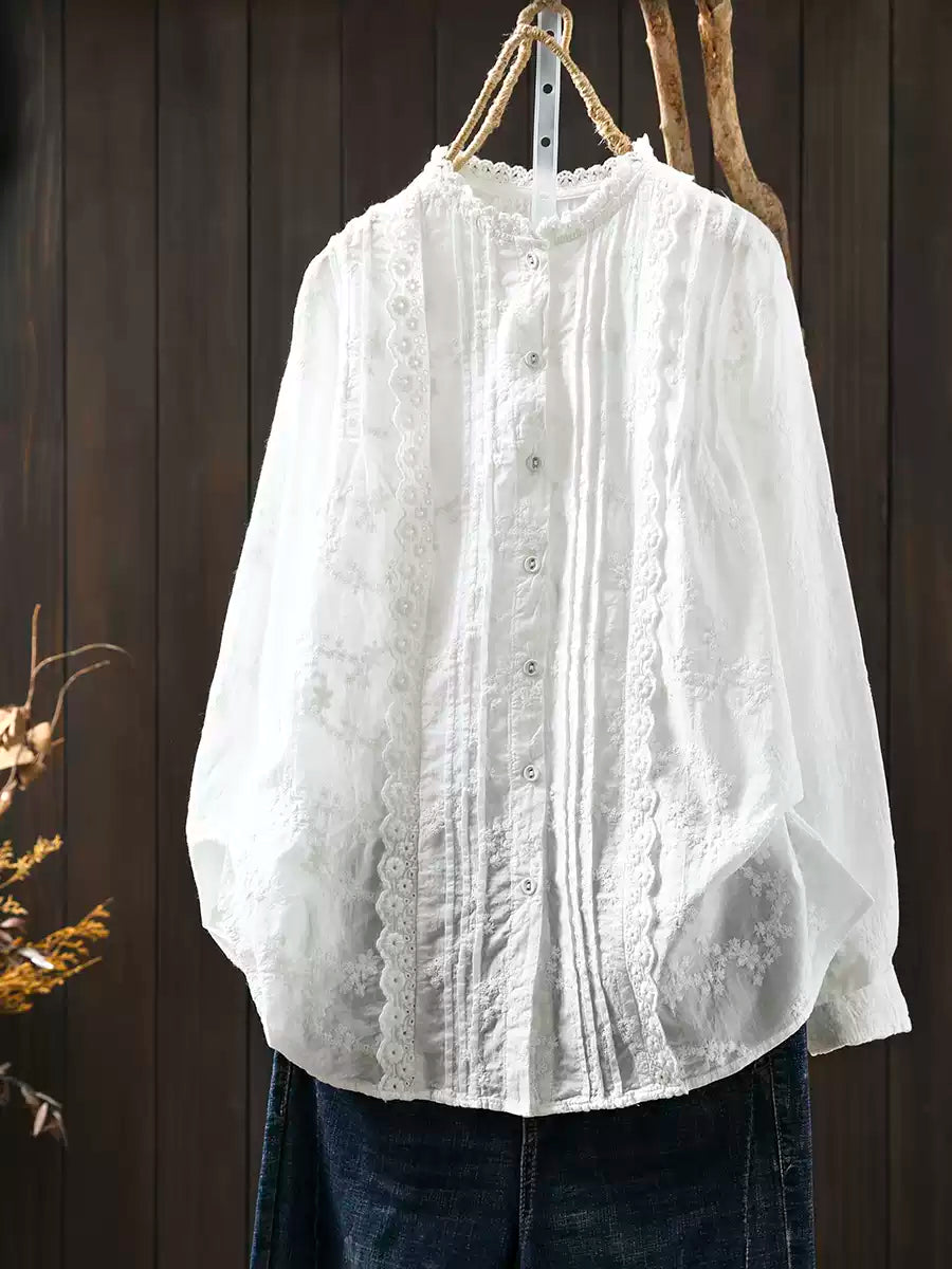 Woman wearing embroidered jacquard cotton blouse styled casually