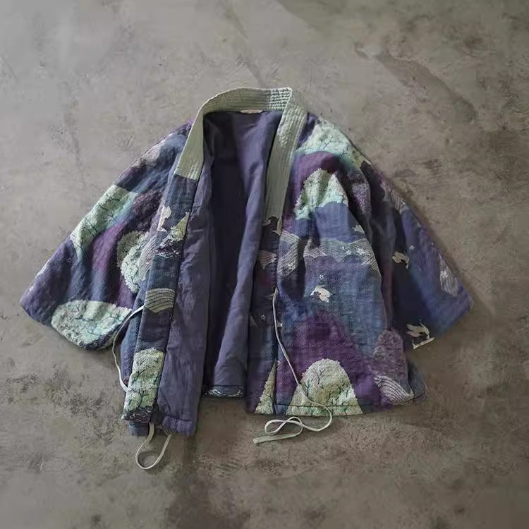 Close-up of the tie-front design and floral quilted cotton fabric.