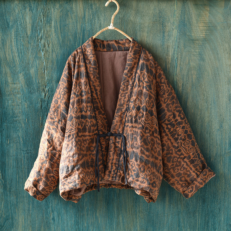 Fabric close-up of vintage floral quilted cotton jacket