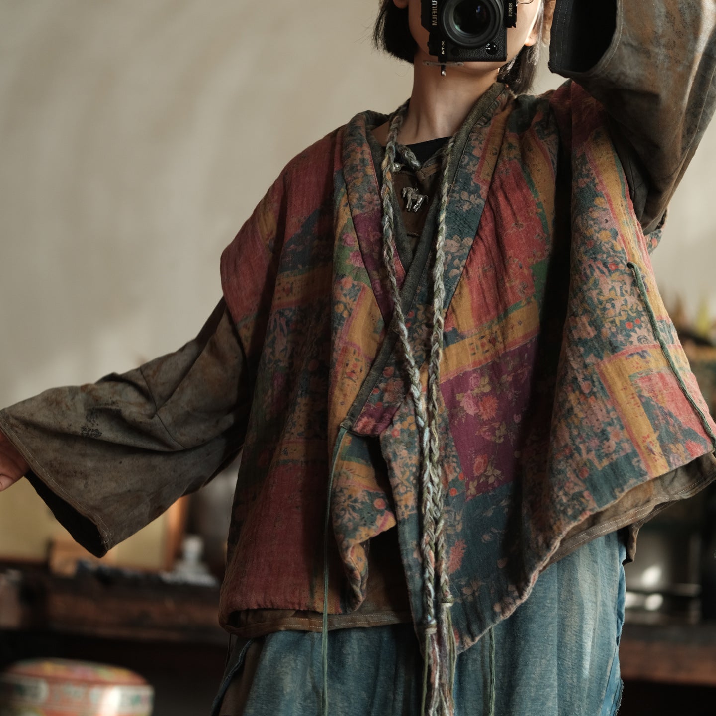 Tie-front detail of ditsy floral quilted vest