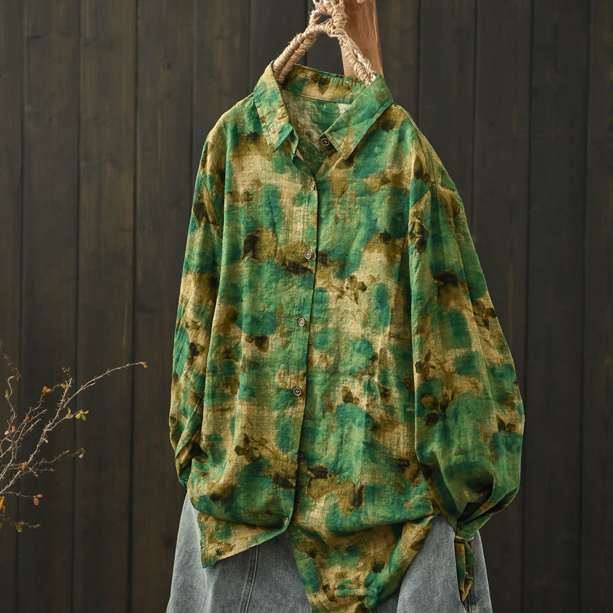 Hippie-style bohemian floral blouse with vintage distressed design, lightweight and unlined, perfect for festival outfits.