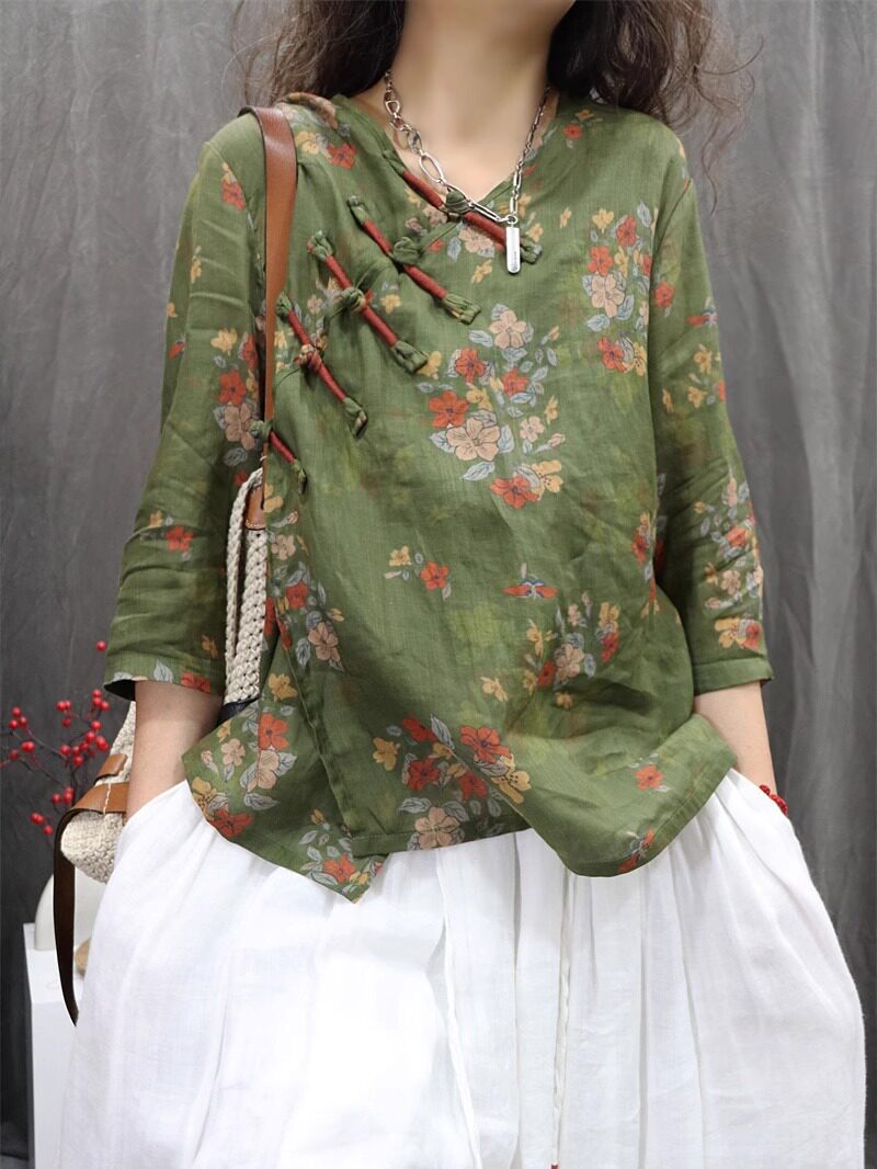 Front view of green floral ramie blouse with 3/4 sleeves