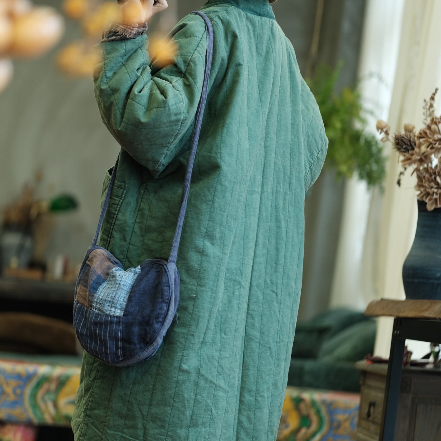 Back view showing quilted texture and relaxed fit