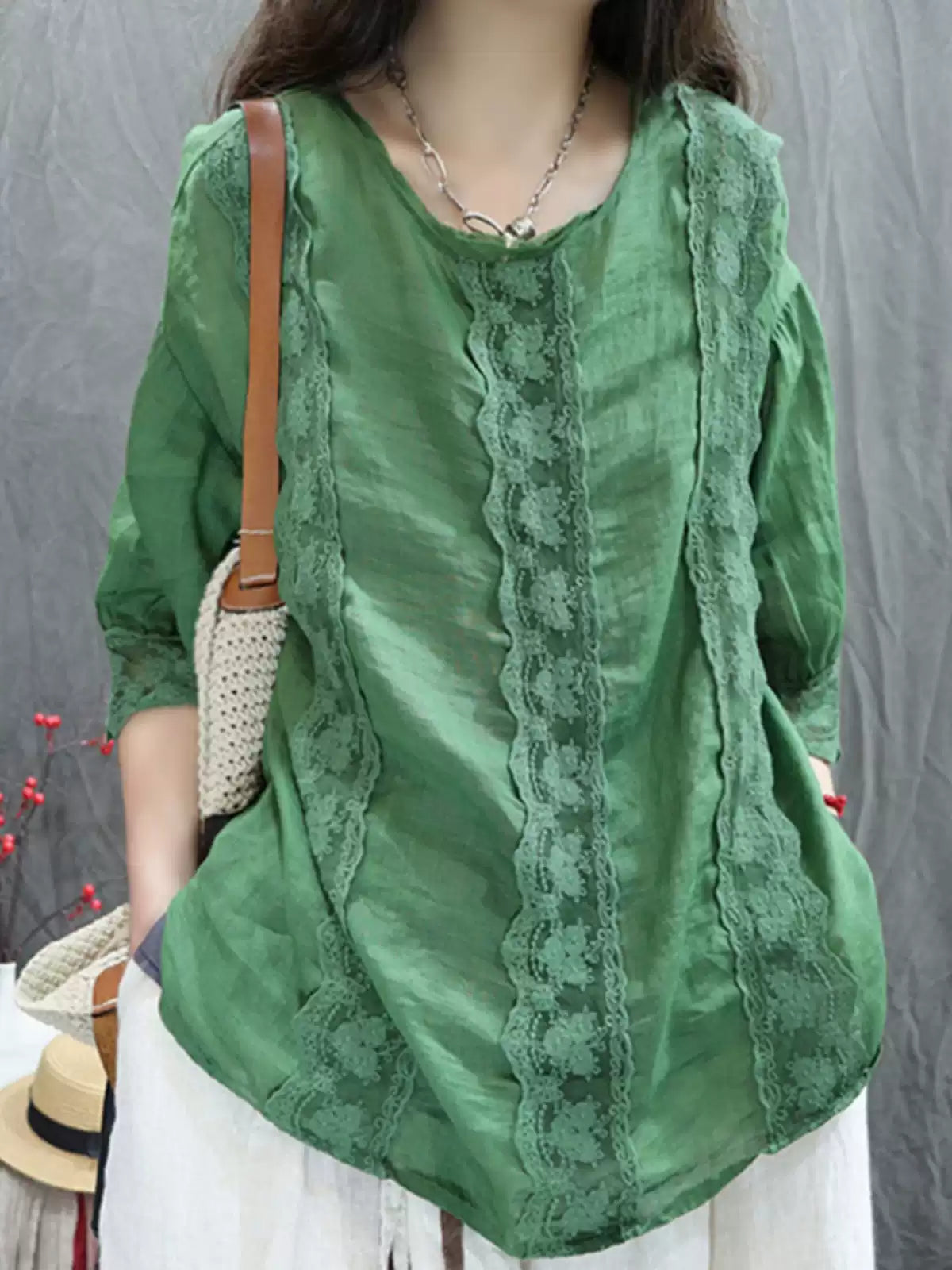 Close-up lace trim detail on ramie blouse