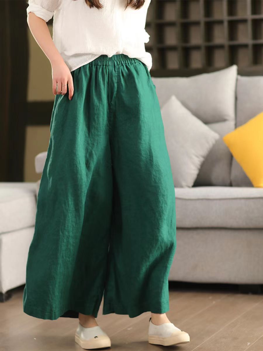 Green front view of relaxed wide-leg linen pants in natural flax