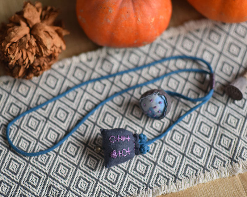 Side view of handcrafted linen lotus accessory