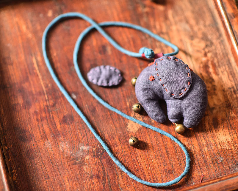 Full view of elephant accessory highlighting soft handmade design