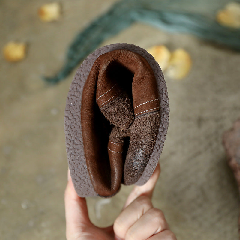 Vintage-inspired leather flats detail