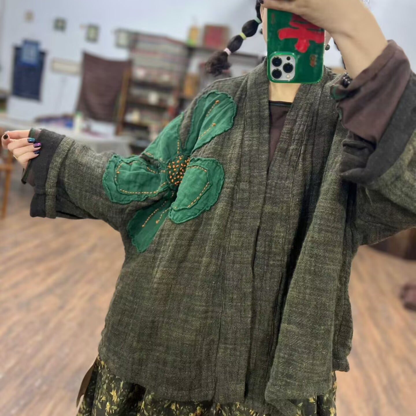 Front view of linen appliqué cardigan for women