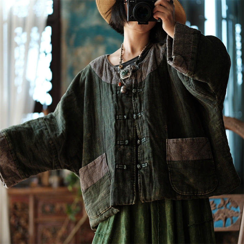 Front view of green distressed quilted short coat vintage jacket