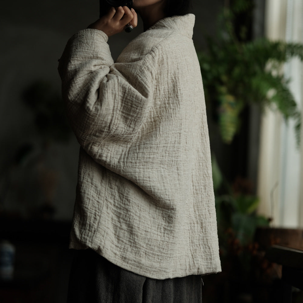 Side view of relaxed fit padded cardigan