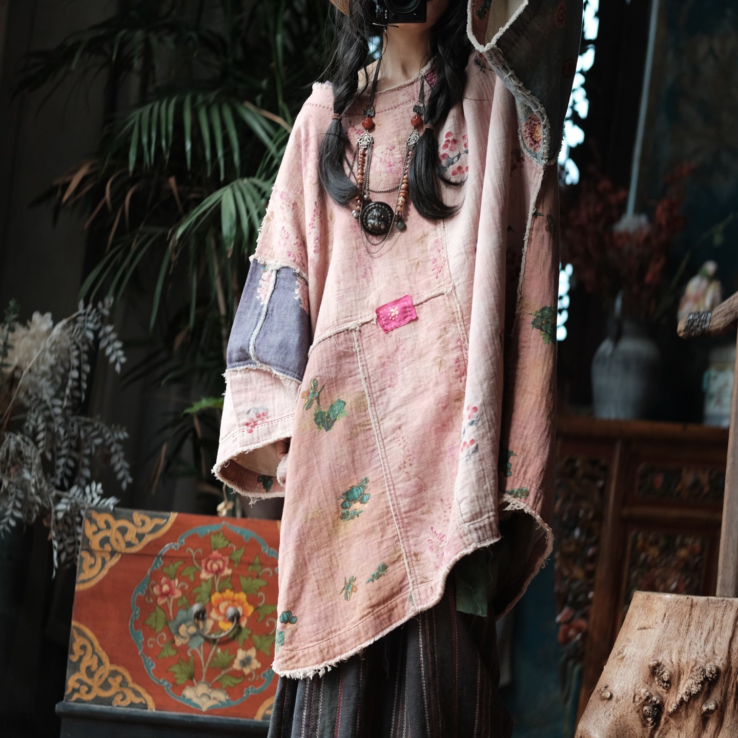 Front view of pink floral patchwork tunic dress