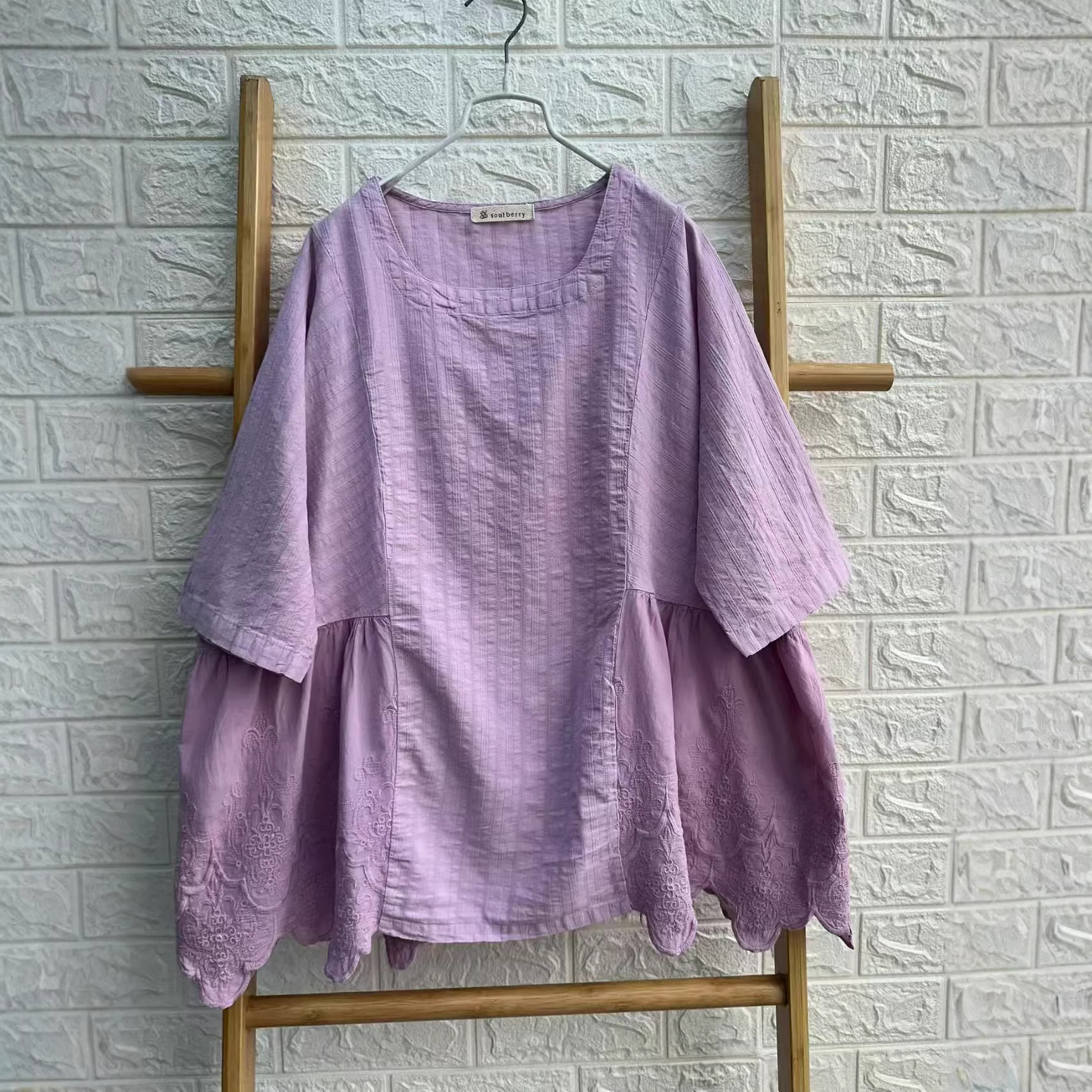 Patchwork cotton fabric detail on embroidered blouse