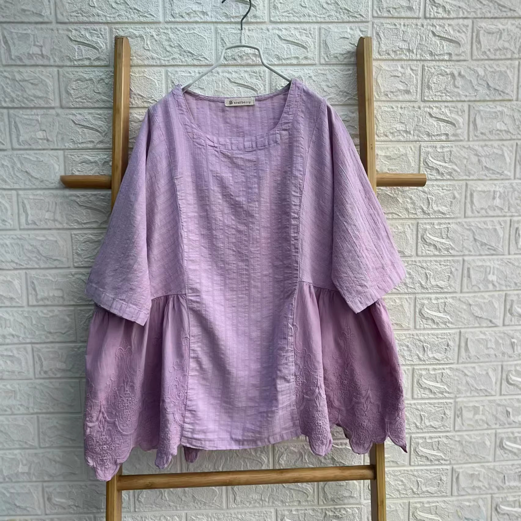 Patchwork cotton fabric detail on embroidered blouse