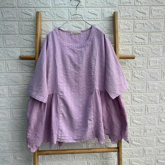 Patchwork cotton fabric detail on embroidered blouse