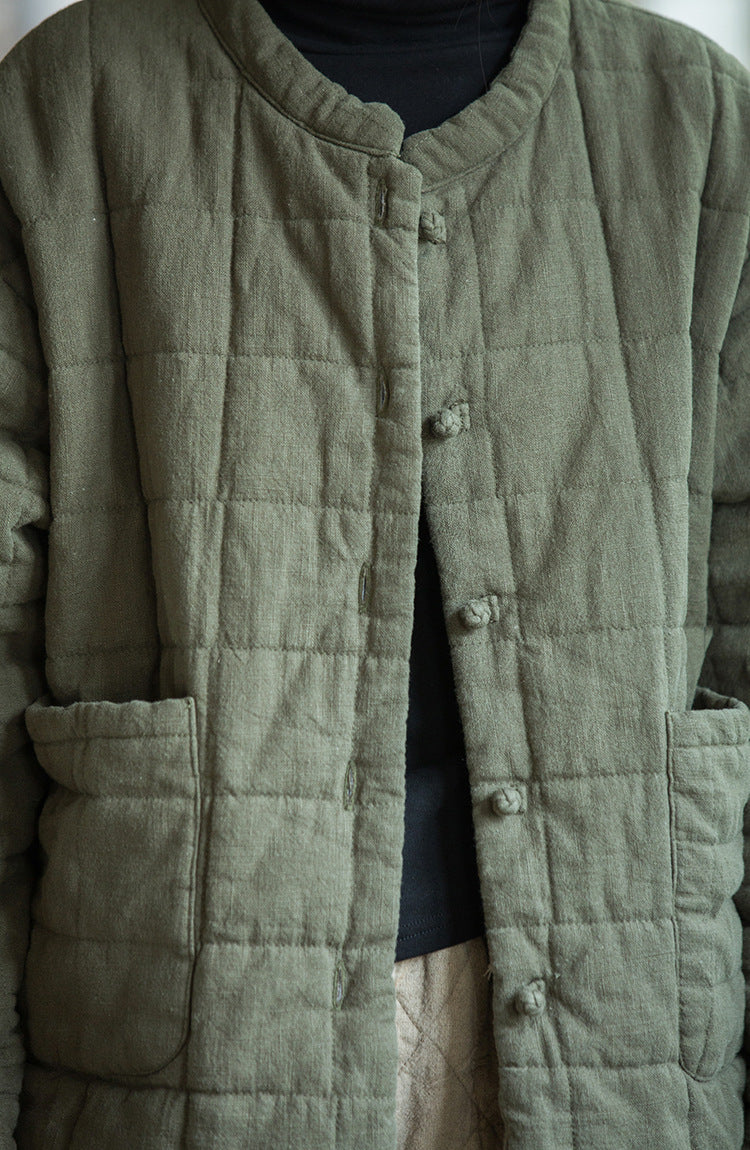 Close-up of padding and stitching details on Ramie Padded Short Jacket