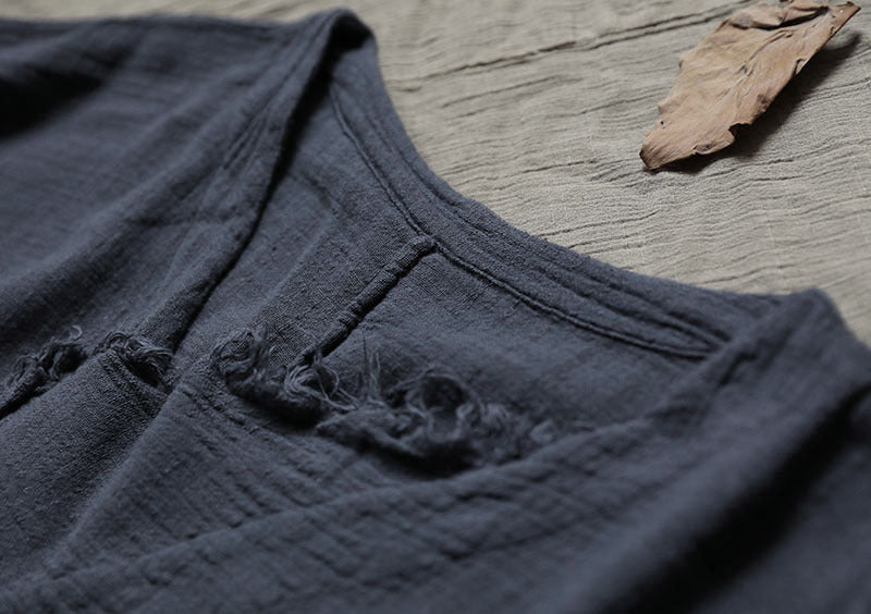 Close-up of raw hem detail showing textured edge finish