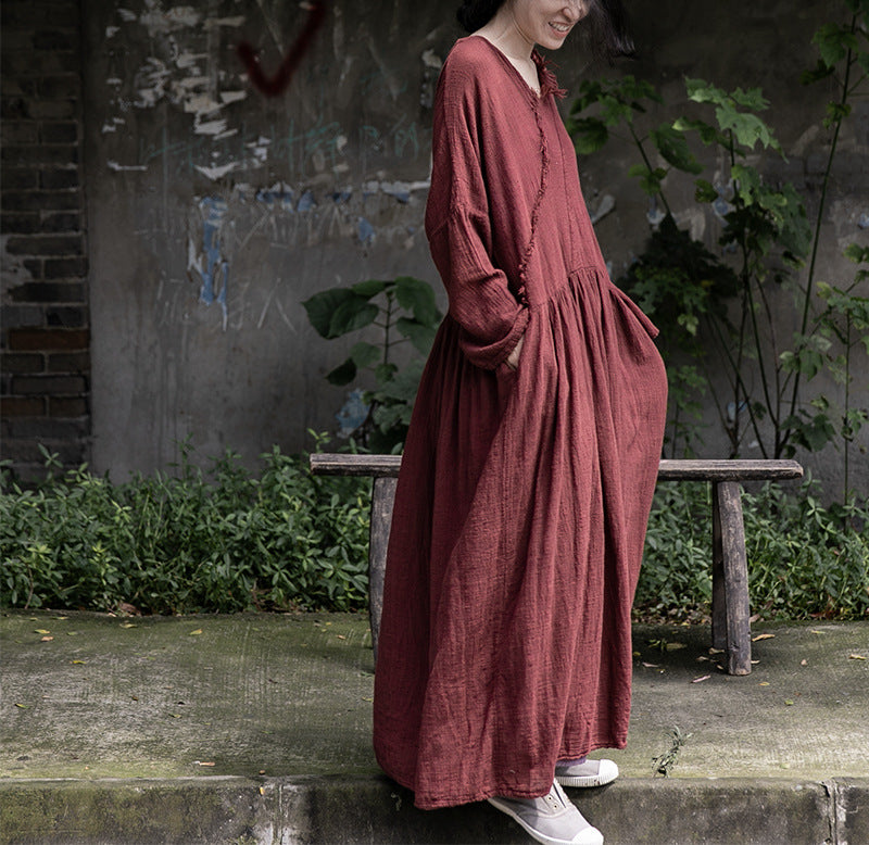 Raw hem draped cotton linen dress front view with a relaxed silhouette