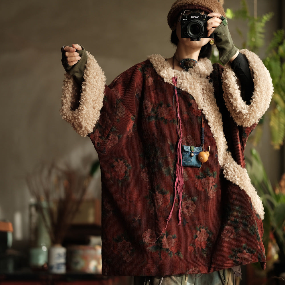 Front view of red floral corduroy sherpa quilted jacket with cozy sherpa lining.