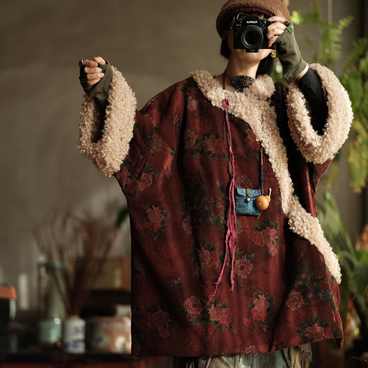 Front view of red floral corduroy sherpa quilted jacket with cozy sherpa lining.