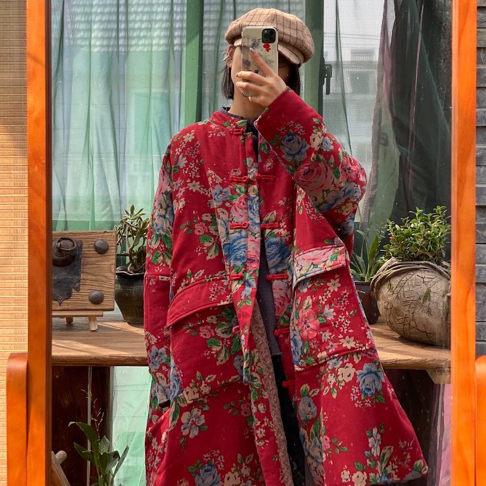 Back view of Red Floral Quilted Jacket, showing relaxed fit and quilted padding