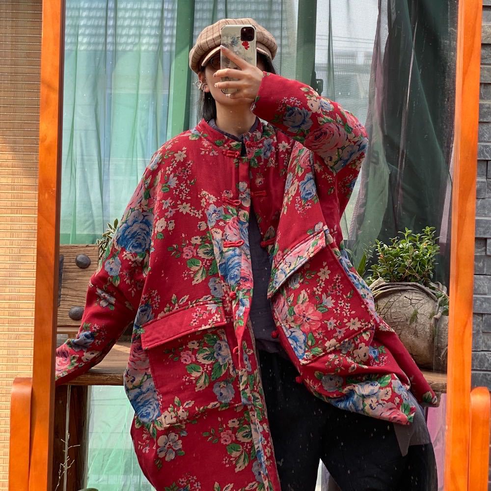 Side view of women wearing Red Floral Quilted Jacket, highlighting silhouette